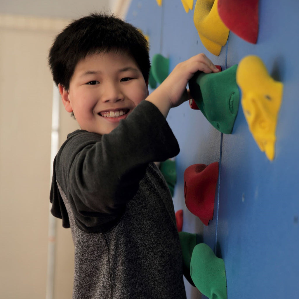 What’s the Difference between a Traverse Wall® and Top Rope Climbing Wall?