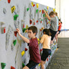 Combination Traverse and Top Rope Climbing Wall Many Climbers