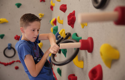 Use the Ultimate Traverse Wall Challenge Course with your climbing wall to add challenge. 
